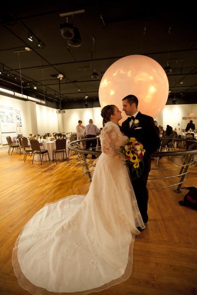 Ashley Price wedding at Nurture Nature Center. Science theater room. Photo by Melissa Engle.            